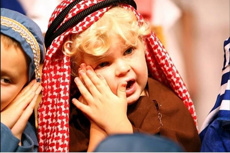 A shepherd watches the flock during Whitehead Primary School's Nativity play in 2009.
