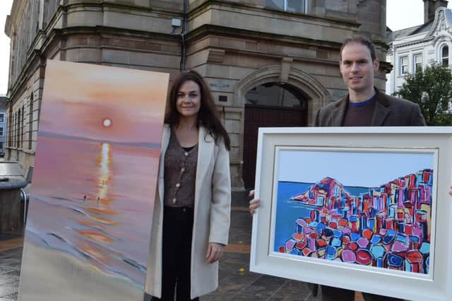 North Coast Husband and wife artists Adrian Margey and Evana Bjourson photographed ahead of their Festive Exhibition at Coleraine Town Hall. Credit Adrian Margey