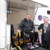 Pictured at Cloonavin with one of Causeway Coast and Glens Borough Council’s new Mobile Accessible Changing Units are the Mayor, Councillor Ivor Wallace, Michael Holden (AccessoLoo Director) and Julienne Elliott, Town and Village Project Manager.