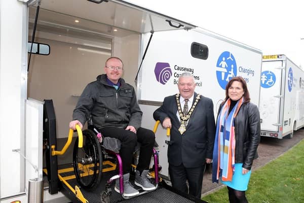 Pictured at Cloonavin with one of Causeway Coast and Glens Borough Council’s new Mobile Accessible Changing Units are the Mayor, Councillor Ivor Wallace, Michael Holden (AccessoLoo Director) and Julienne Elliott, Town and Village Project Manager.