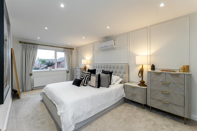 Principal bedroom with glass panelled, double doors leading to en-suite.