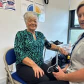Wilma gets her blood pressure checked by Sharon from the Southern Health and Social Care Trust.