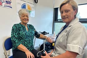 Wilma gets her blood pressure checked by Sharon from the Southern Health and Social Care Trust.