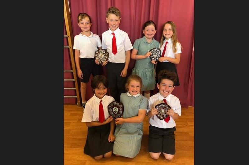 Pictured are prize-winners from P5 at Donacloney Primary School near Lurgan, Co Armagh. Back Row: Robbie Davidson, David Beattie, Molly Tumilty, Sarah Sullivan. Front Row: Iva Sullivan, Molly Herdman, Tobie Hilary.