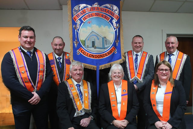 The Quinn family pictured with Bannerette presented by Hon. Bro. Sammy Quinn. In the picture is Bro Derek Quinn. Bro. Stephen Quinn, Bro. Gary Quinn, Bro. Charlie Quinn, Hon. Bro. Sammy Quinn, Sis Valerie Quinn and Sis Muriel Quinn