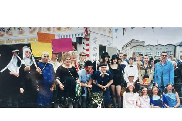 Some of the fancy dress parade participants from previous Portrush Raft Race years.