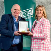 Micky Fleming from Churchlands Golden Gloves receives his award from Federation of Irish Sport Chairperson Clare McGrath during the Volunteers in Sport Awards at The Crowne Plaza in Blanchardstown, Dublin