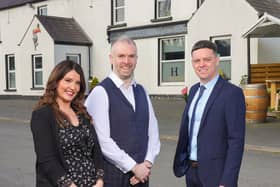 Caorlan and Ciara McAllister pictured with Ulster Bank business development manager Lee White.