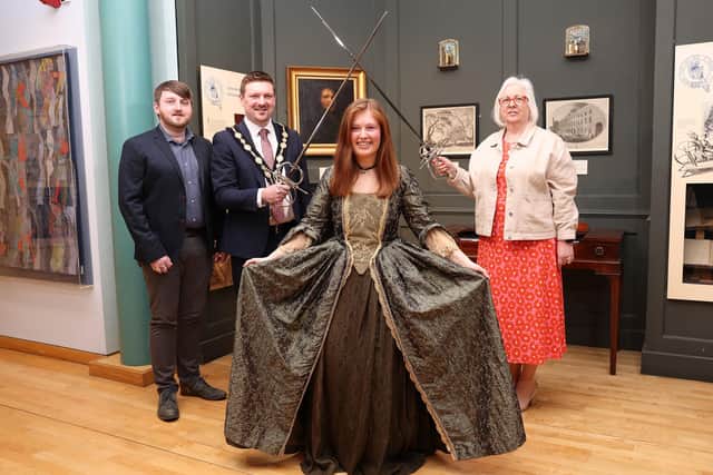 Back row (L-R) Councillor Aaron McIntyre, Chair of the Leisure and Community Development Committee; The Right Worshipful the Mayor, Councillor Scott Carson and Councillor Hazel Legge, Chair of the King’s Coronation Working Group. Front row is Catherine Thompson, part of the education team in ILC&LM in seventeenth century costume to reflect the period of 1660s when Lisburn was rewarded for its loyalty to Charles II by granting a Tuesday market and Cathedral status to Lisburn.