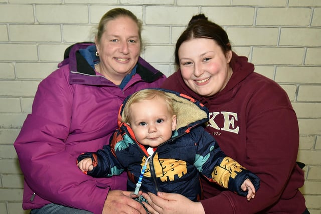 All smiles at the Mourneview estate Christmas lights switch on and party are, from left,Stephanie Calvert, Oakley Lavery (10 months) and Rachel Winter. LM50-248.