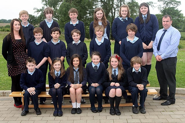 Ballymacrickett Primary Seven teacher Mr Brendan O'Neill and Classroom Assistant Miss Shaneen McDonald with their Class in 2012