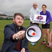 Councillor Aaron McIntyre, Chair of Leisure & Community Development Committee and Adrian Daye from Jog Lisburn & Atlas Running is joined by local runners from Jog Lisburn to launch the City of Lisburn 5K
