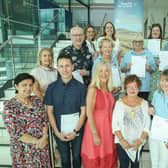 The Mayor of Mid and East Antrim, Alderman Gerardine Mulvenna with council representatives and tour guides. Credit: Paul Faith