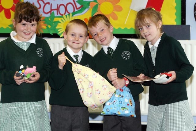 St Aloysius pupils Victoria Lee, Nicholas McShane, Peter Kelly and Shania McQuaide pictured in 2007 with Dream Bags filled with toys to be distributed to children in areas of conflict or post-conflict such as Africa, the Middle East and Northern Ireland.