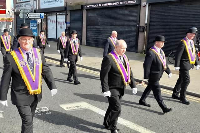Larne Royal Arch Purple District Chapter's parade makes its way through the town.