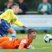 Coleraine's Syzmon Bednarz  and Kilmarnock's  Frankie Nolan during Tuesday's Boys Minor Group B match at Broughshane.