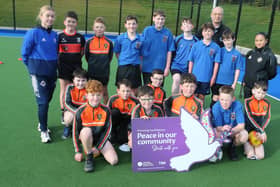 Pupils from Ballycastle High and Cross & Passion College who participated in “Different Ball Same Goal” sessions in Ballycastle during October. Included in the photo is John Fall Sports Development Manager (Sport & Wellbeing).