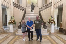 David Hilditch (centre) delivering his letter of resignation from the Assembly at Stormont, accompanied by DUP colleagues, Councillors Cheryl Brownlee and Marc Collins. Photo submitted by the DUP