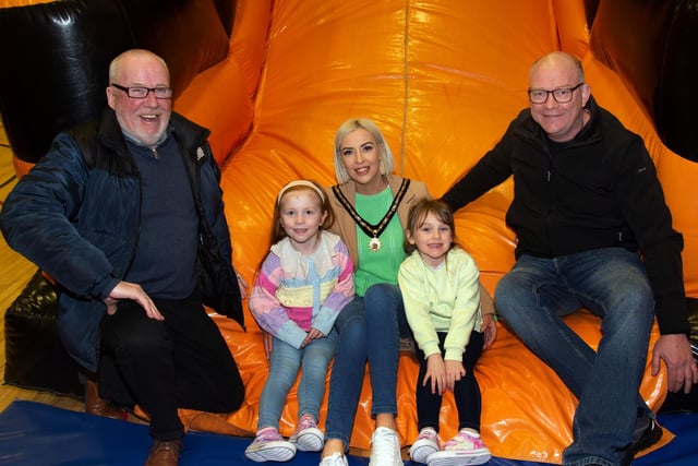Deputy Lord Mayor of ABC Council, Sorcha McGeown dropped in to the great Park Road and Obins Street St Patrick's fun day in St Mary's Youth Club on Saturday. She is Vince McAleenan, Eimi Byrne-Hogan (5), Aubree Gilmore (5) and Councillor Paul Duffy. PT11-232. PT11-232.