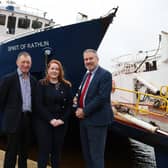 Dunaverty Ltd has celebrated a successful first year as operators of the lifeline ferry service to Rathlin Island, by announcing it has increased its team to 18 staff.  Pictured are Charles Stewart, director at Dunaverty Ltd, Dawn Hynes, managing director at Dunaverty Ltd and Robert Lynn, business manager at Danske Bank