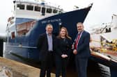 Dunaverty Ltd has celebrated a successful first year as operators of the lifeline ferry service to Rathlin Island, by announcing it has increased its team to 18 staff.  Pictured are Charles Stewart, director at Dunaverty Ltd, Dawn Hynes, managing director at Dunaverty Ltd and Robert Lynn, business manager at Danske Bank