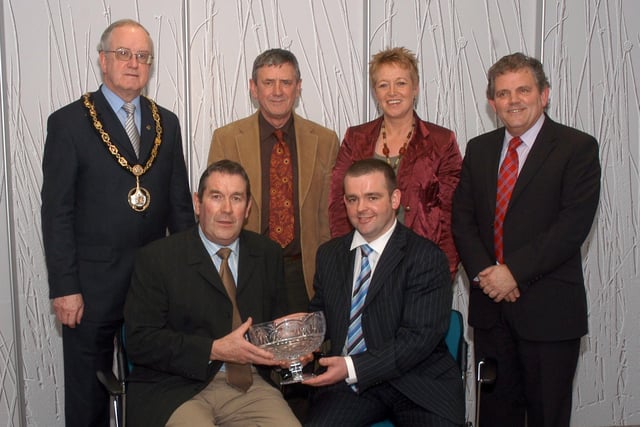 Pictured at the Craigavon Sports Awards in 2007 is Councillor Alan Carson, leisure services chairman presents the male personality award to Mervyn Shaw for his son Gareth. Included are Craigavon Mayor Kenneth Twyble, Robbie Clarke, CSAC chairman, Mrs Heather Shaw and Adrian Logan.