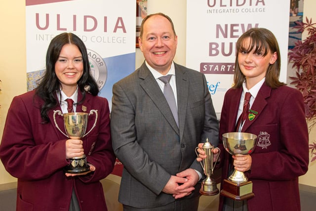 Mr Houston with Hannah Montgomery, winner of the NI Screen Cup for excellence in Fine Art at GCSE and Izzy O’Hare, winner of the William Rowan Hamilton Award for excellence in Mathematics and the Ulidia Cup for overall excellence.