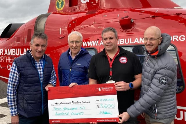Presenting Legacurry’s cheque to the Air Ambulance Northern Ireland