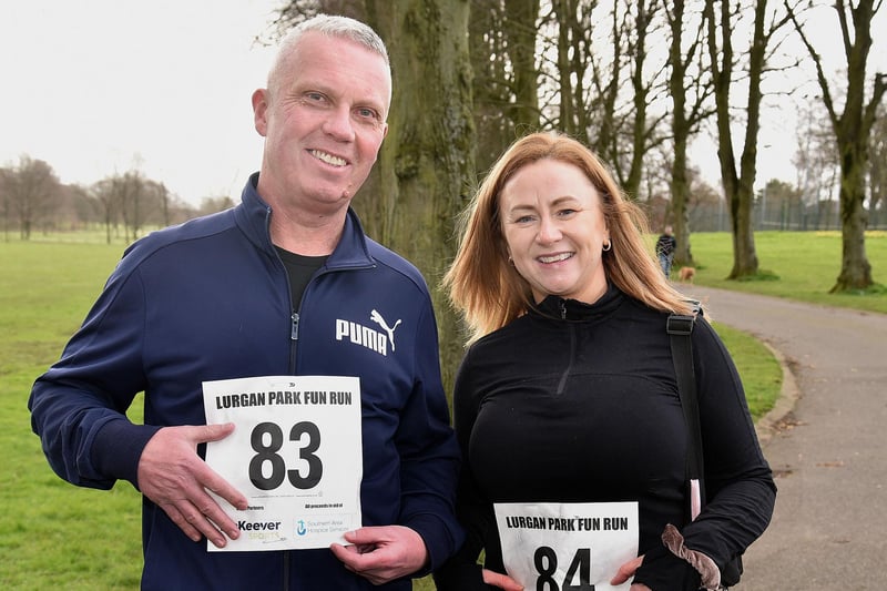 Terry Gallagher and Sinead Wright getting their numbers on before the Lurgan Park run in aid of the Southern Area Hospice. LM13-202.