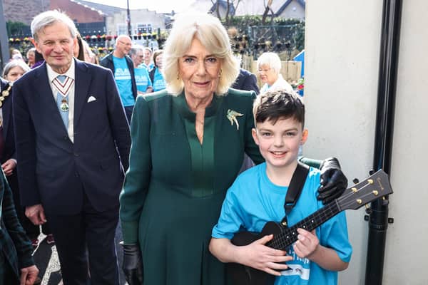 Queen Camilla was met by a young musician when she visited Atlas Centre in Lisburn. Photo by William Cherry/Presseye