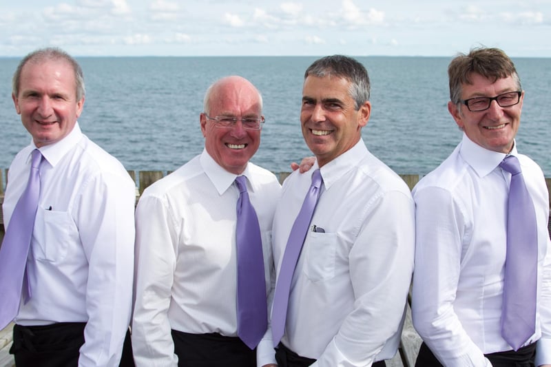 Stephen Foster, Henry Fletcher, Steven Canning and Derek Foster pose for a photo at the fashion tea. INCT 39-476-RM