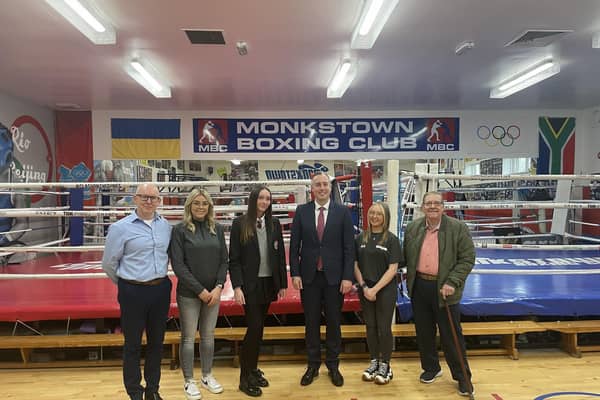 Education Minister Paul Givan MLA alongside Monkstown Boxing Club's Chairperson Billy Snoddy MBE, Project Manager Paul Johnston MBE, Lead Youth Worker Amy Stewart and service users. (Pic: Department of Education).