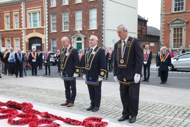 Laying wreaths at the Lisburn War Memorial