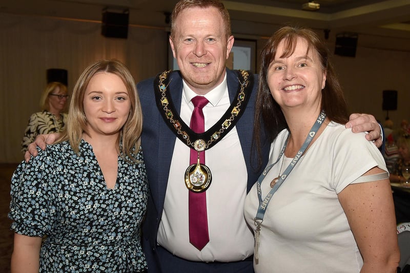 Cllr Paul Greenfield pictured with two staff from the mayor's office, April Robinson, left, and Susan Parks, mayor's secretary, who organised the Coronation Tea Party on Wednesday. PT17-299.