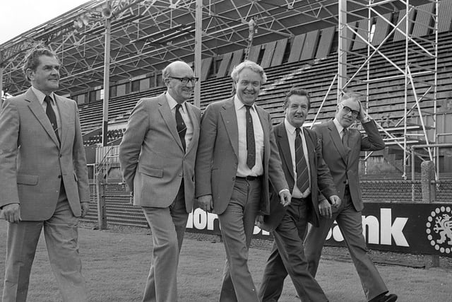 Education Minister, Nicholas Scott, visited the home of Ulster Rugby at Ravenhill Rugby Ground in Belfast in September 1982. He inspected the massive ground improvement that was taking place at the venue. He is pictured during his visit with the president of the Ulster Branch IRFU, Mr T G Lindsay, second left, Mr Fred Wilson, left, Mr John Saulters and Mr Charlie Wright