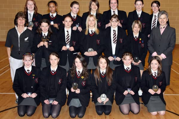 Dr. A. Scott, Principal of Crumlin Integrated College and Mrs. C. Kilpatrick pictured in 2007 with pupils who were winners and runners-up in the annual badminton and table tennis tournament. Pupils are, Melissa Pollock, Nicole McFarland, Melissa McAlernon, Jemma Greenberg, Kerry Huddleson, Kerry Ann Bunting, Diane Hartness, Stephanie Petticrew, Rebecca Coughlan, Grace Greaves, Tyne Heywood, Raura Robb, Amy Lidster, Jenny Edwards, Donna Mulholland, Michelle Johnston, Fiona Lavery and Catherine Trowlan