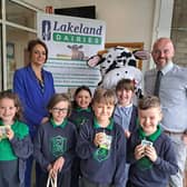 P3 and P5 pupils, Aideen O’Hagan (Key Account Manager Lakeland Dairies,) with the Vice Principal of Saint Malachy’s Primary School in Coleraine, Mr Ryan Crawford