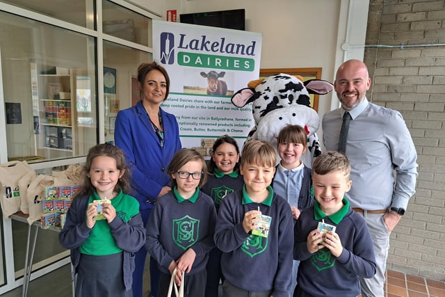 P3 and P5 pupils, Aideen O’Hagan (Key Account Manager Lakeland Dairies,) with the Vice Principal of Saint Malachy’s Primary School in Coleraine, Mr Ryan Crawford