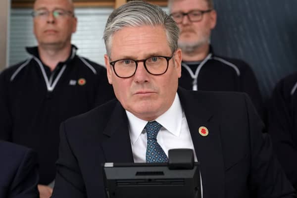 Prime Minister Sir Keir Starmer speaks on the phone to US President Donald Trump during a visit to the West Midlands. Photo: Alberto Pezzali/PA Wire