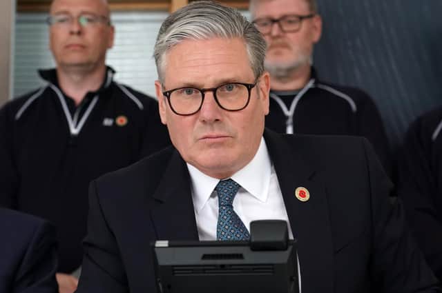 Prime Minister Sir Keir Starmer speaks on the phone to US President Donald Trump during a visit to the West Midlands. Photo: Alberto Pezzali/PA Wire