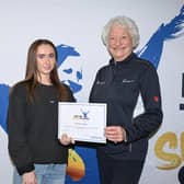 Hannah is pictured collecting her award from Lady Mary Peters. Pic credit: MPT