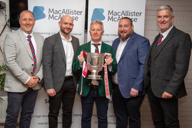 Glenn McCluggage, president of Larne RFC, with the Gibson Cup lifted by Larne FC for the second season in a row after winning the Sports Direct Premiership.
