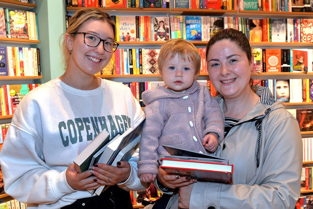 A the opening of the new Waterstones store at Rushmere on Friday are from left, Eve Johnston, Lydia Patterson (1) and mum, Rebekah. PT41-206.