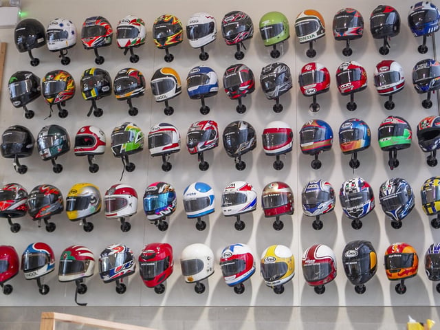 Helmets belonging to many well-known riders  pictured at the The North West 200 - Then & Now exhibition held Ballymoney Museum organised by the Causeway Coast and Glens Borough Council