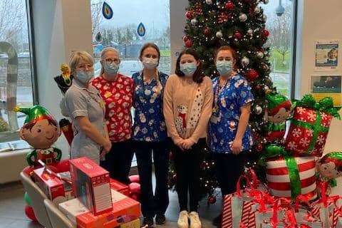 Maisie McBride at the Blossom Unit of Craigavon Area Hospital donating Christmas presents to children who were sick over the festive season.