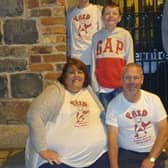 Alison McNamara and her husband Brian, along with children Jordan and Reece. C2348507