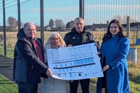 Lisburn North Councillor, Jonathan Craig, Seymour Hill & Conway Residents Association members Jayne Hudelson and Tommy Jackson with Northern Ireland's Deputy First Minister and Lagan Valley MLA Emma Little-Pengelly, holding blueprints for the new hub. Pic credit: LDRS