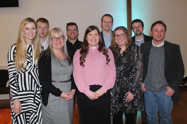 The Rev Danielle McCullagh, front, centre, with members of The Hub staff team