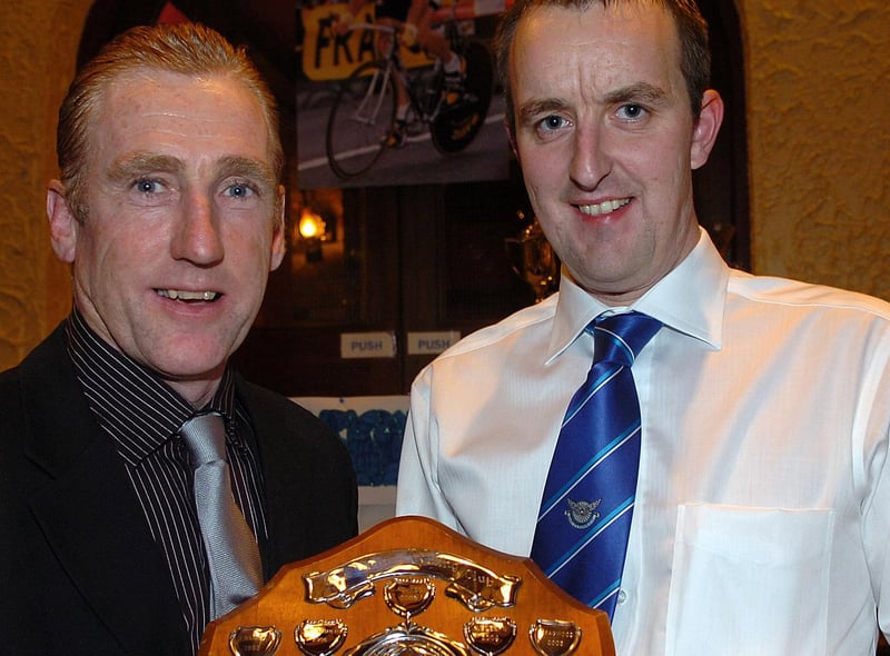 Ruben Bruce, winner of the  Handicap Time Trial Trophy receives his award from special guest Sean Kelly at RT Autoparts East Tyrone CC 60th anniversary presentation dinner held in 2007.