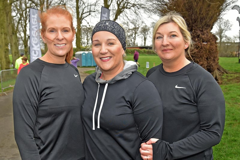 All smiles before Sunday's charity fun run in Lurgan Park are from left, Mary Joyce, Aisling McAvoy and Lisa Fegan. LM13-208.